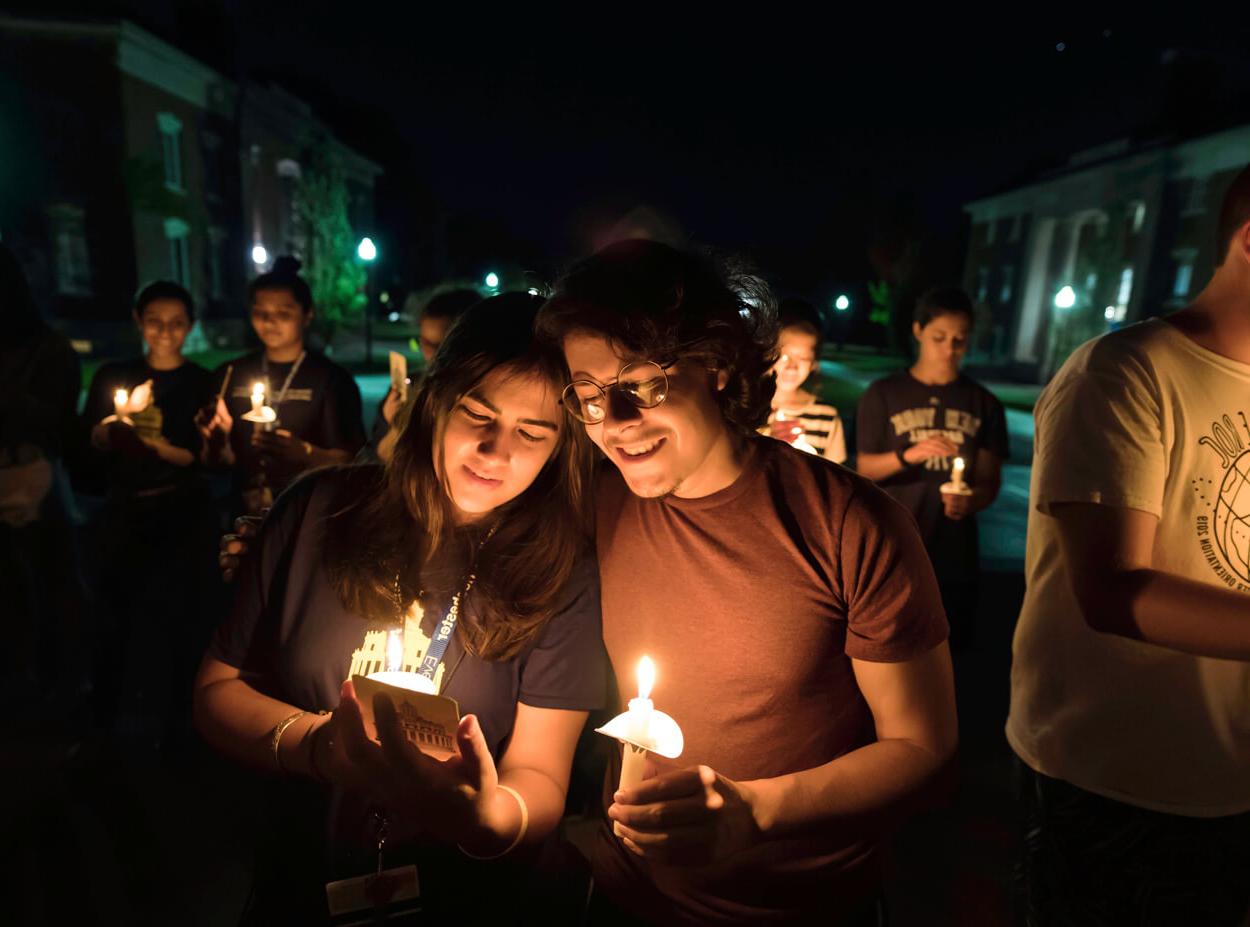 Students take part in the candlelight ceremony tradition at the University of Rochester